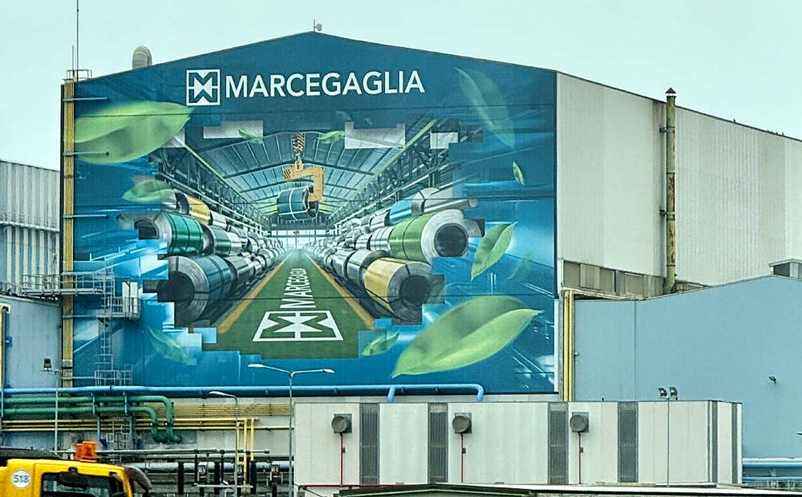 Factory facade printed with a large photorealistic image using the Ceramatek process