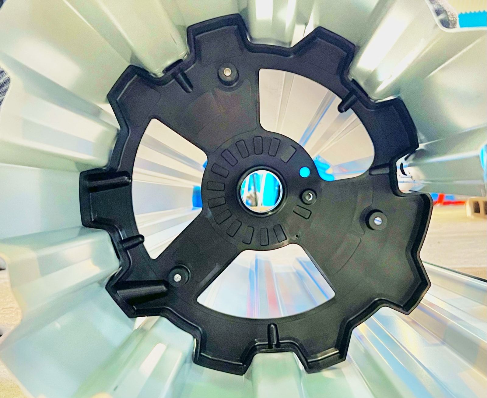 Composite spring end fitting with integrated clamp